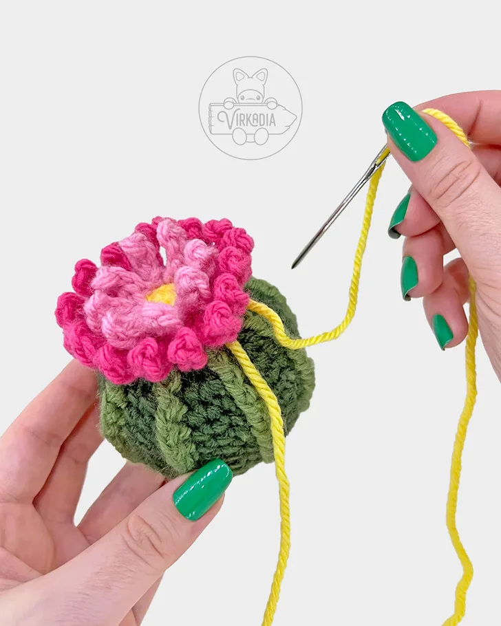 crochet cactus amigurumi pattern tutorial of how to attach the flower
