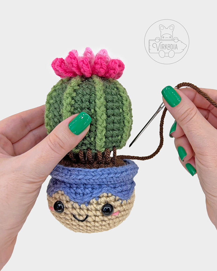 crochet cactus amigurumi pattern tutorial of how to sew the plant and pot together
