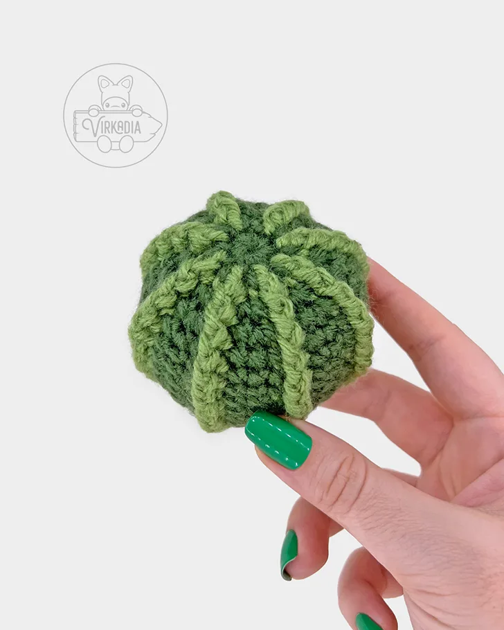 crochet cactus amigurumi pattern tutorial of how the finished plant should look before adding the flower