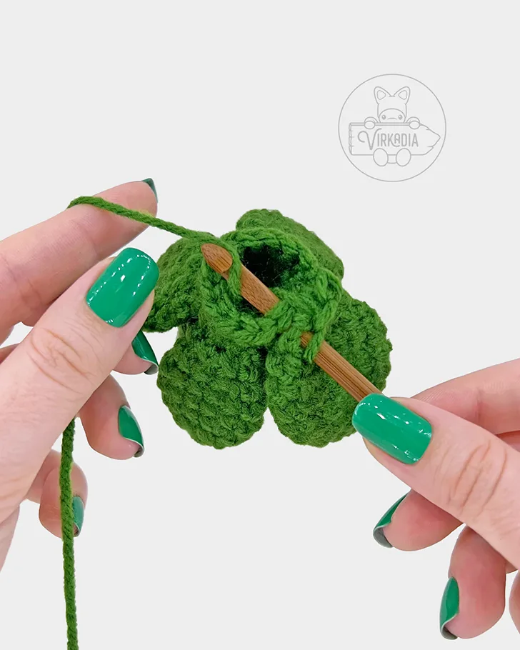 crochet succulent amigurumi pattern tutorial of how to attach a large leaf