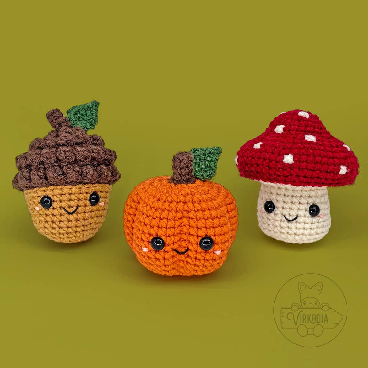 free crochet mushroom, crochet pumpkin, and crochet acorn amigurumi plushies for DIY fall decor, cottagecore style decorations, and handmade holiday gifts for Halloween, autumn, and Thanksgiving