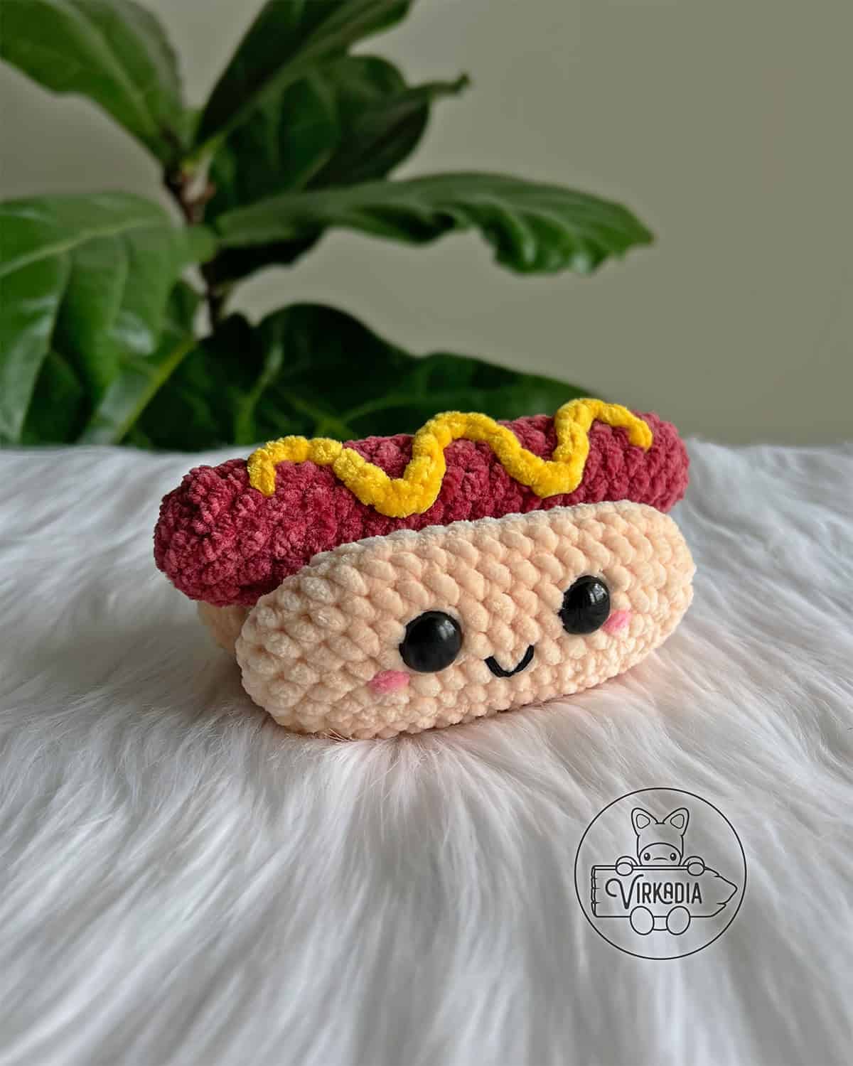 crochet hot dog amigurumi plushie in chunky yarn for barbecue party decorations, DIY holiday decor, summer crafts, and handmade gifts