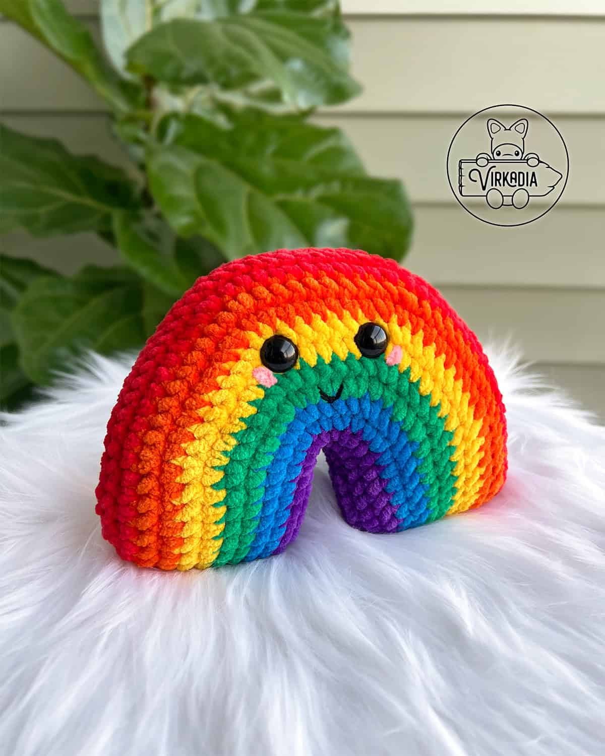 crochet rainbow amigurumi plushie in chunky yarn for St. Patrick's Day decorations, Pride Month celebrations, DIY holiday decor, spring crafts, and handmade gifts
