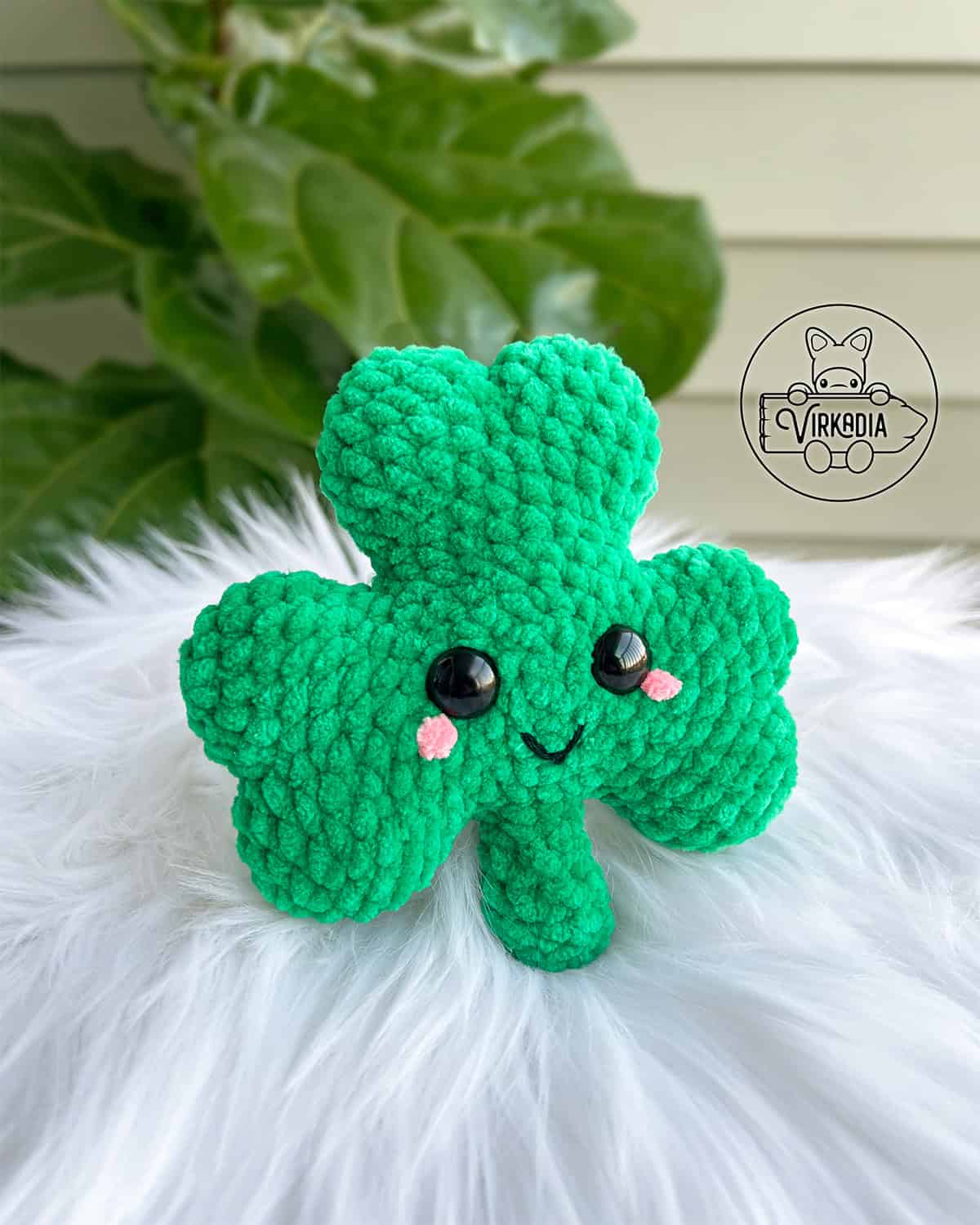 crochet shamrock clover amigurumi plushie in chunky yarn for St. Patrick's Day decorations, DIY holiday decor, spring crafts, and handmade gifts