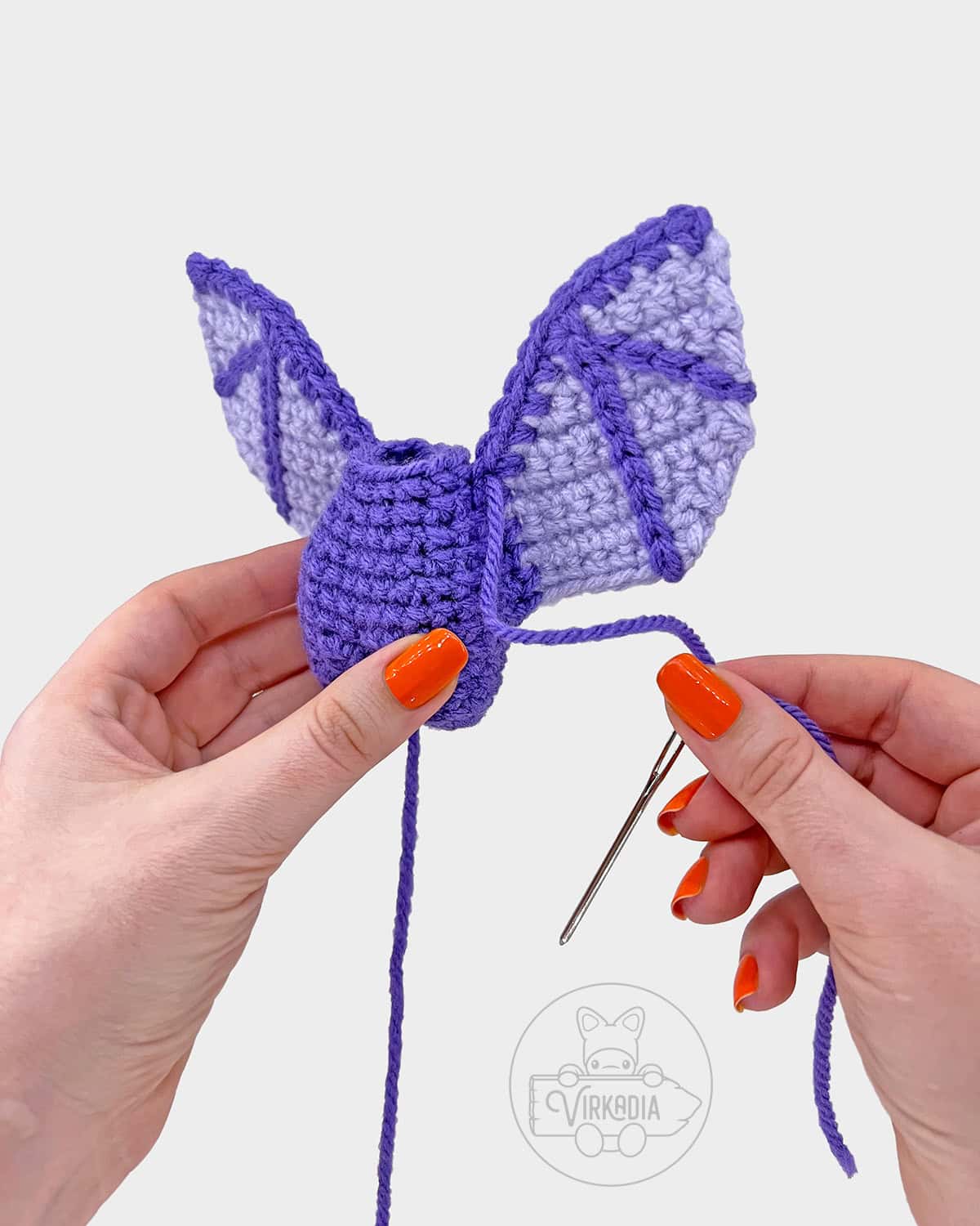 free crochet bat amigurumi pattern tutorial of how to attach the wings