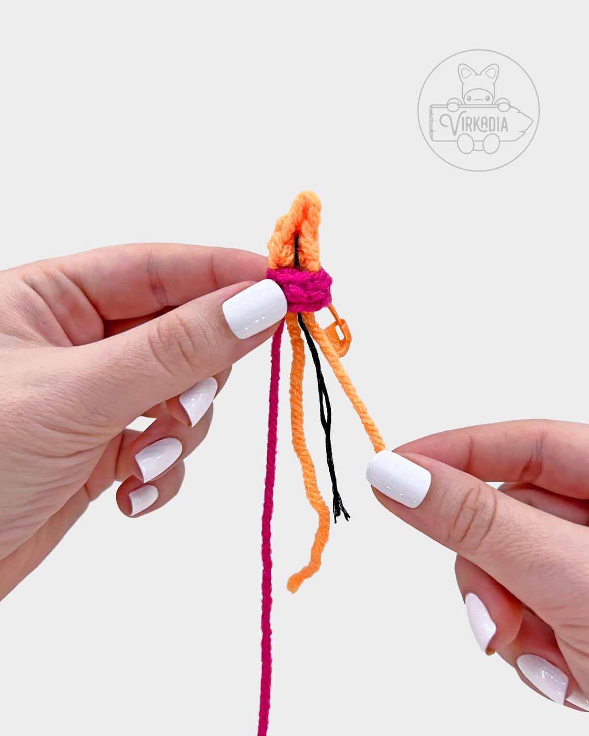 free amigurumi pattern tutorial of how to attach the flame onto the candle