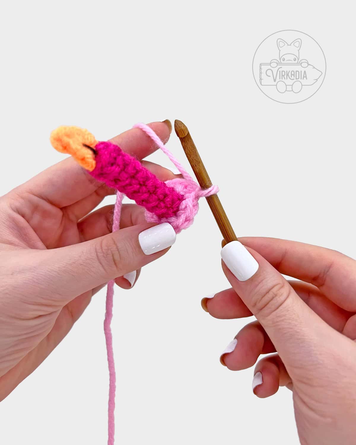 free crochet birthday cake amigurumi pattern tutorial of how to work off of the candle