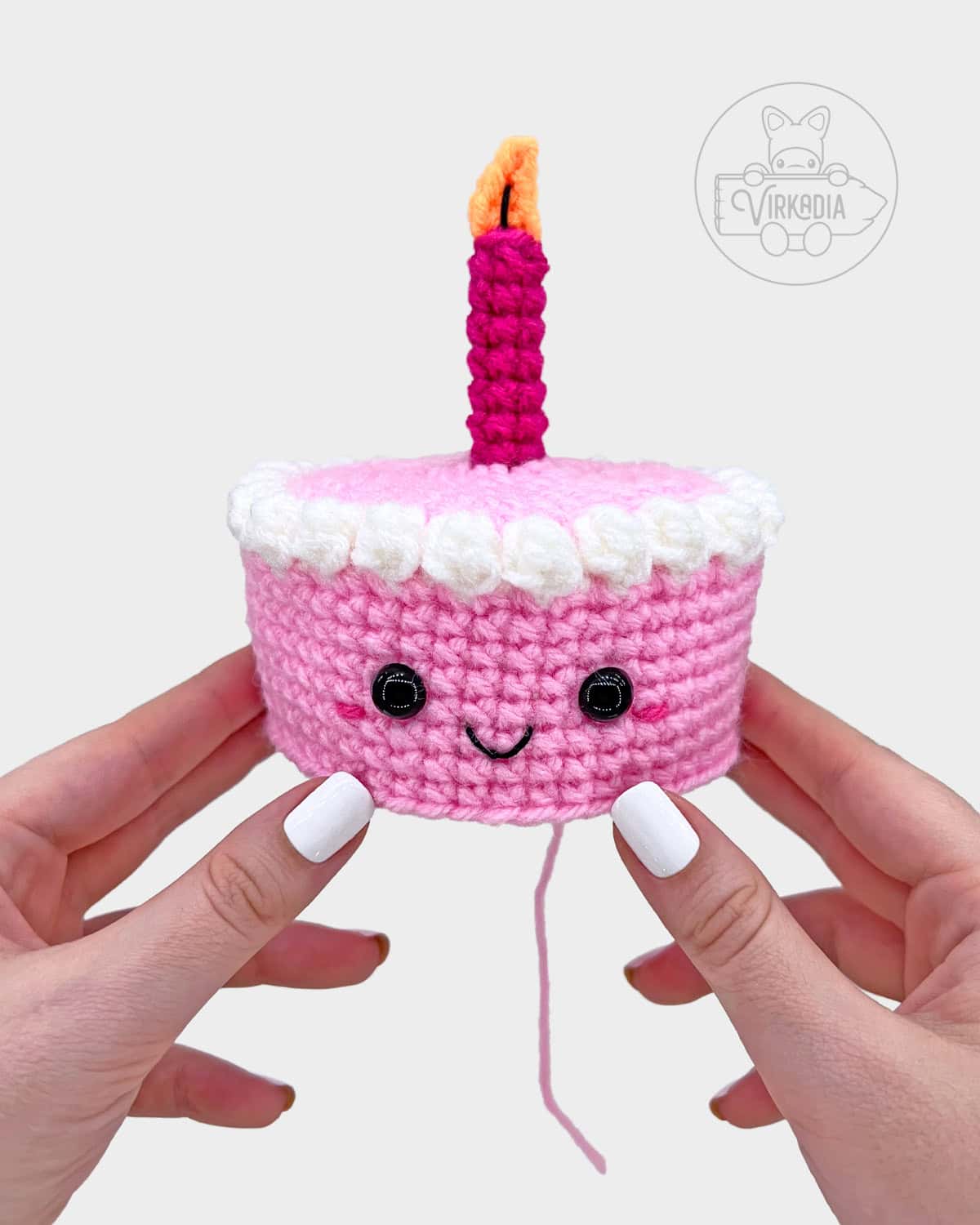 free crochet birthday cake amigurumi pattern tutorial of how the face should look on the dessert