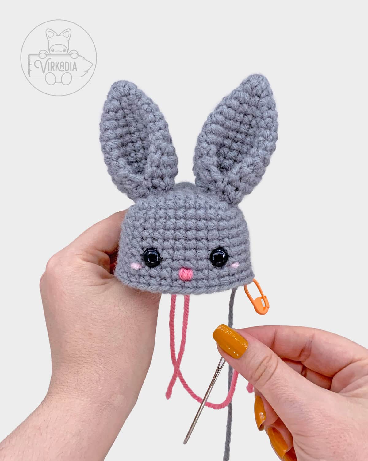 free crochet bunny amigurumi pattern tutorial of how to embroider the nose onto the face