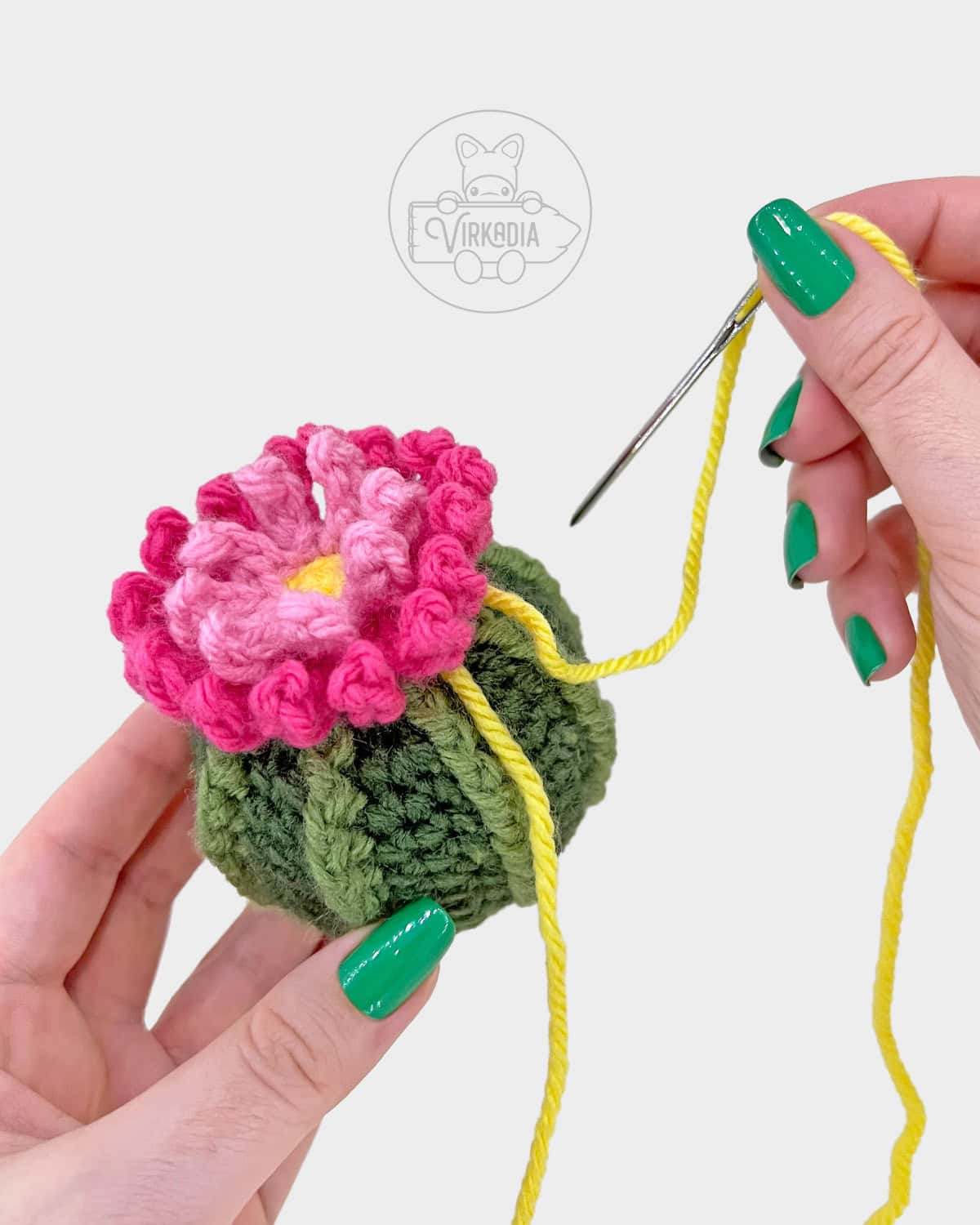 crochet cactus amigurumi pattern tutorial of how to attach the flower