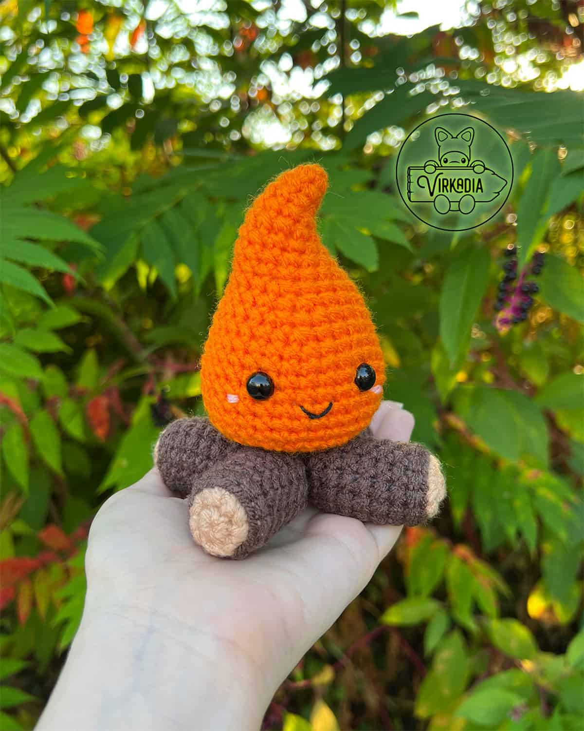 candid shot of free crochet campfire amigurumi plushie for summer crafts, camping decorations, DIY home decor, and homemade gifts
