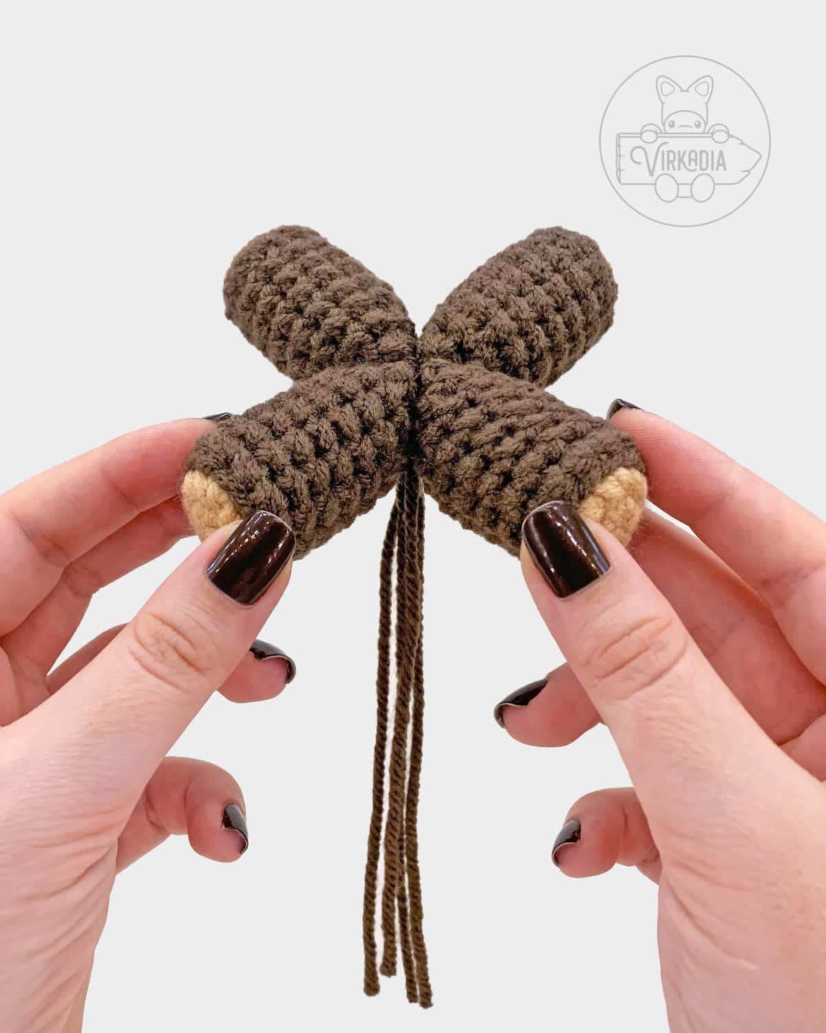 free crochet campfire amigurumi tutorial of how the logs should look after sewing them together