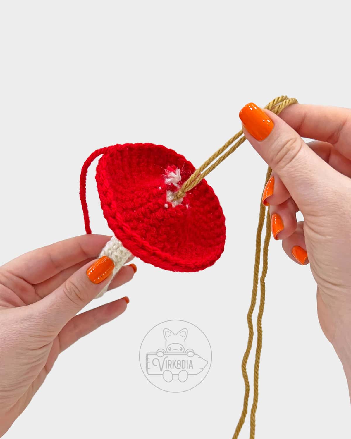 free amigurumi tutorial of how to add the center pull string
