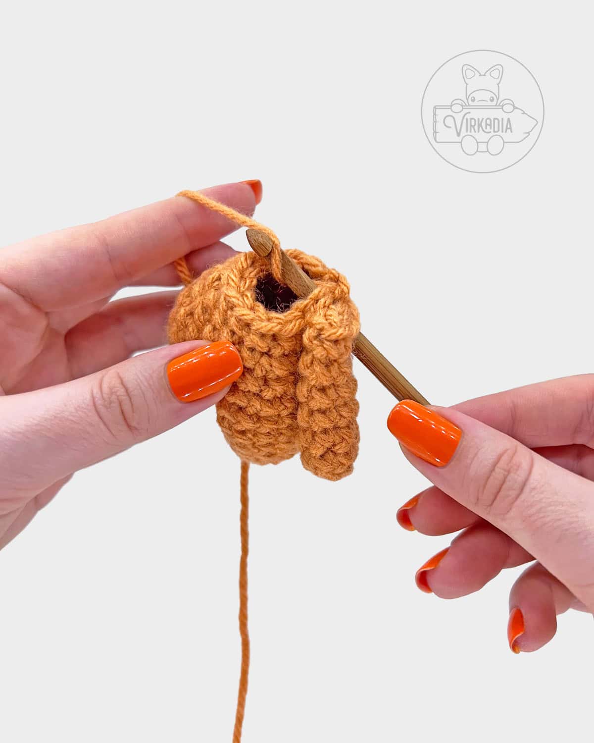 free amigurumi pattern tutorial of how to attach the arms