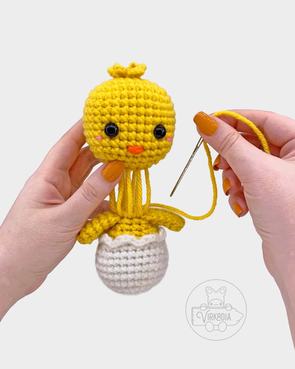 free crochet chick amigurumi pattern tutorial of how to sew the head onto the body