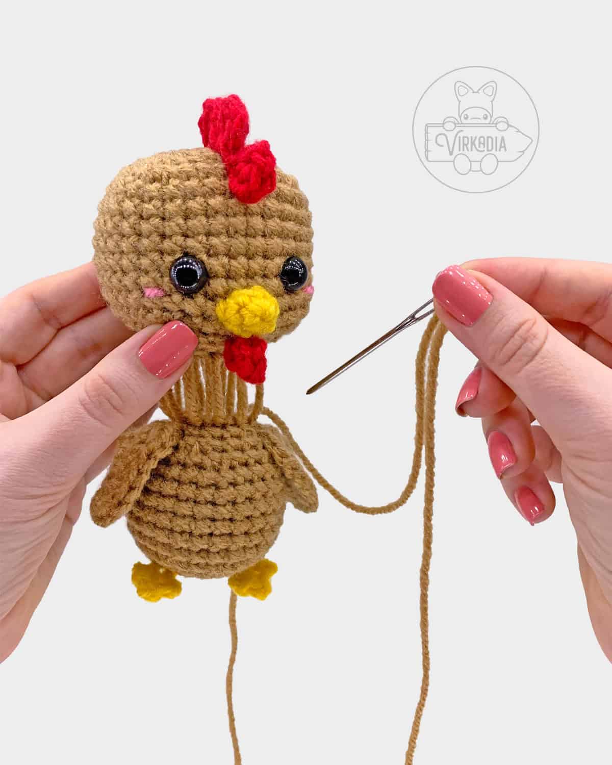 free crochet chicken amigurumi pattern tutorial of how to sew the head onto the body