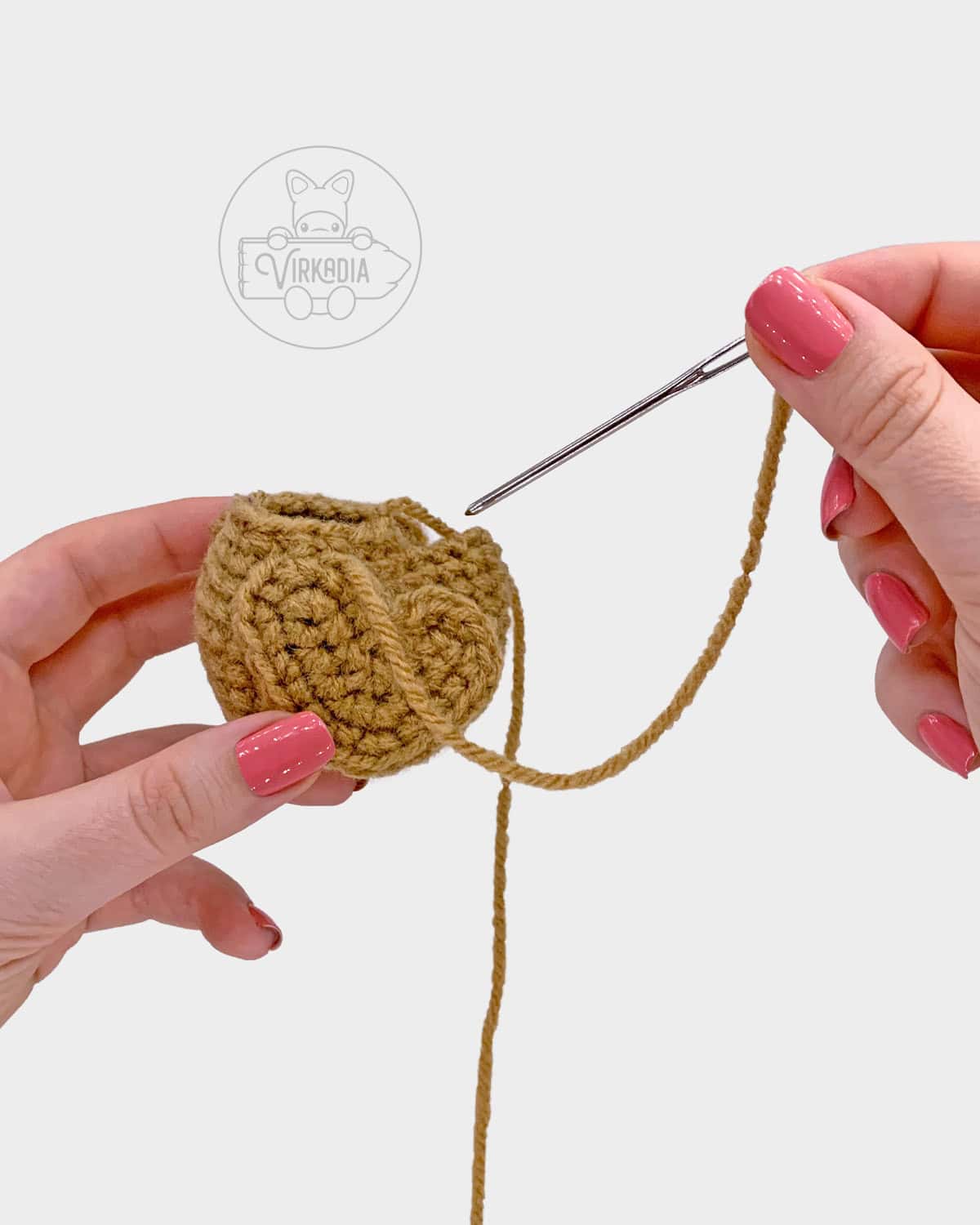 free crochet chicken amigurumi pattern tutorial of how to attach the wings to the body