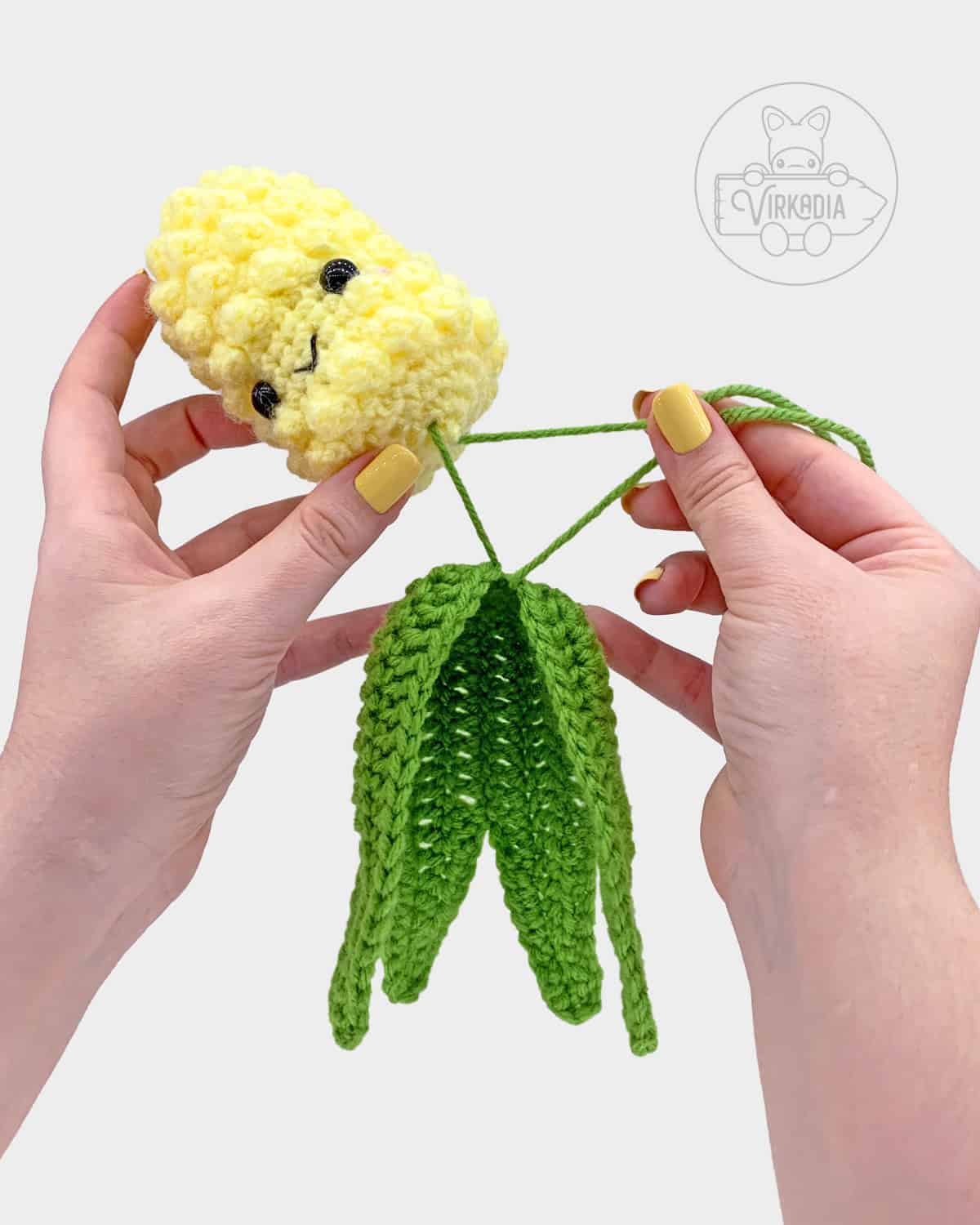 free crochet corn amigurumi pattern tutorial of how to sew the husk and cob together