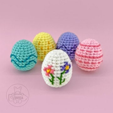 free crochet easter eggs pattern, including five embroidery tutorials for stripes, spots, waves, zig-zags, and cross stitch flowers for DIY Easter home decor, DIY gifts for Easter baskets, and spring decorations