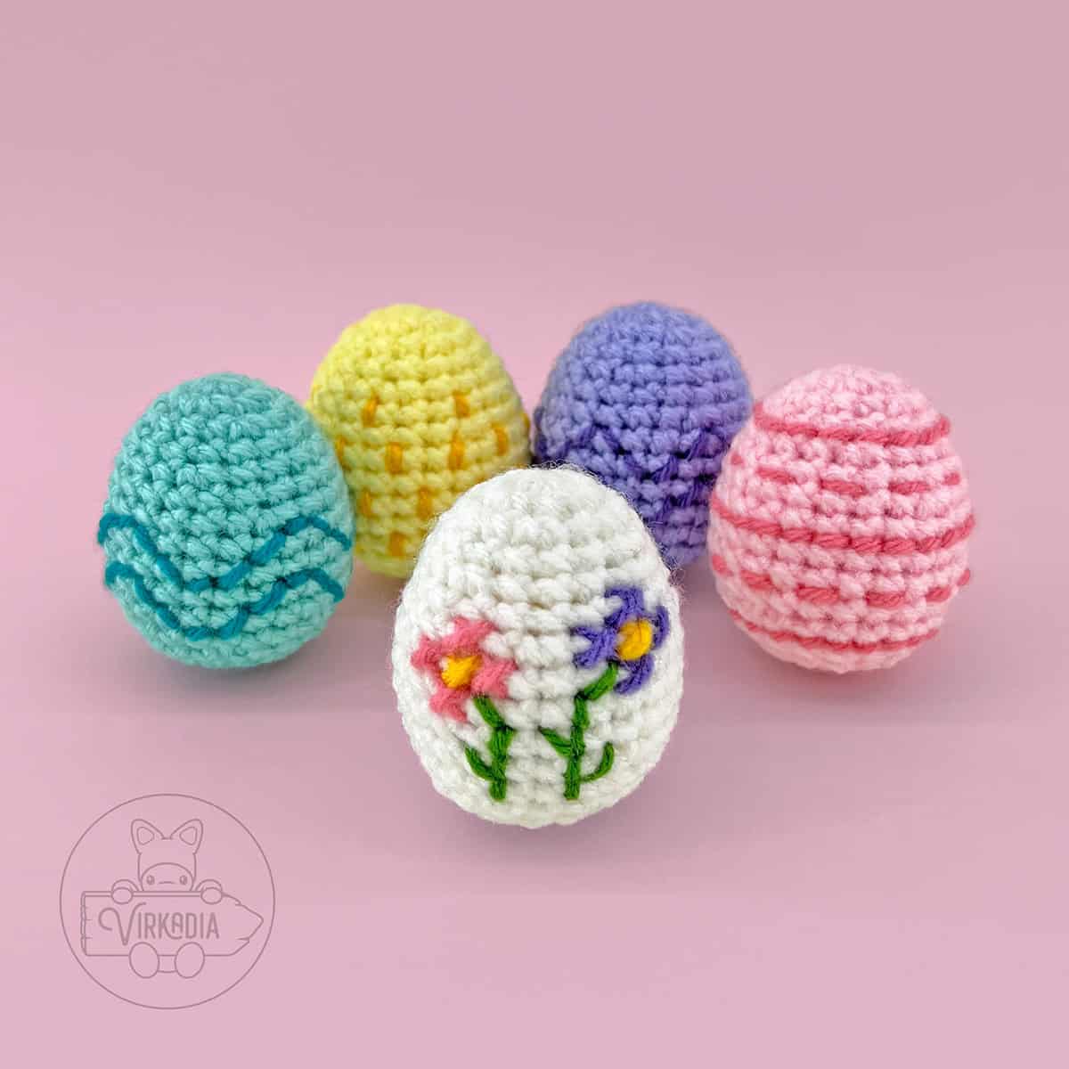 free crochet easter eggs pattern, including five embroidery tutorials for stripes, spots, waves, zig-zags, and cross stitch flowers for DIY Easter home decor, DIY gifts for Easter baskets, and spring decorations