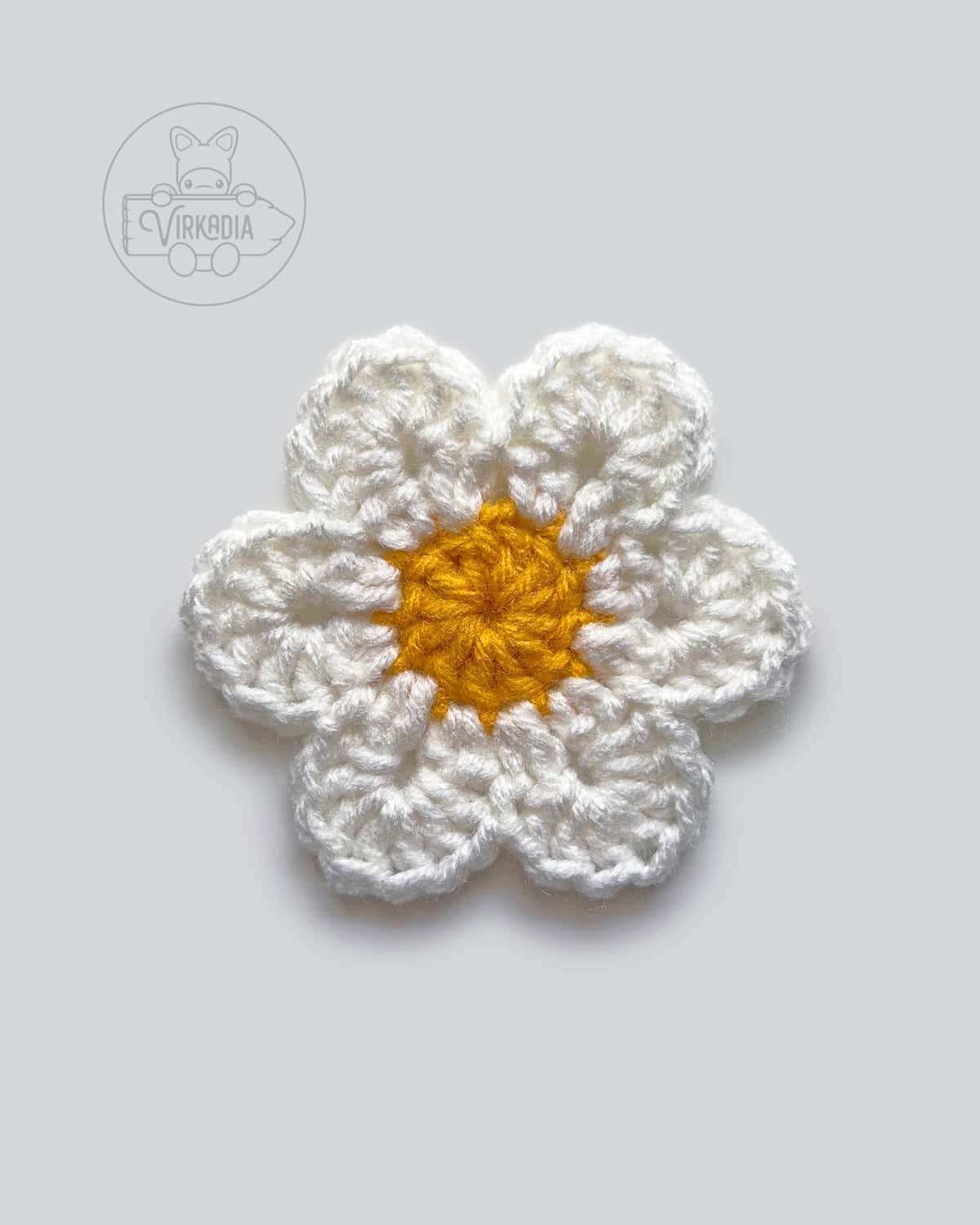 free crochet flower motif pattern tutorial of how round 3 should look after finishing the petals