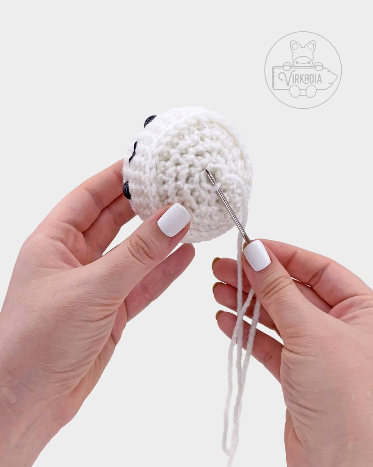 free amigurumi tutorial of how to sew the crochet ghost closed
