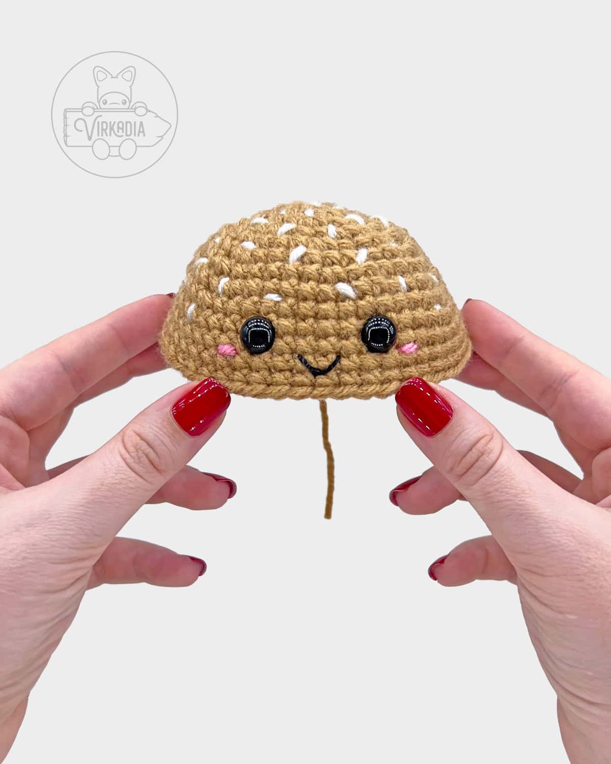 free crochet hamburger amigurumi pattern tutorial of how the face should look on the bun