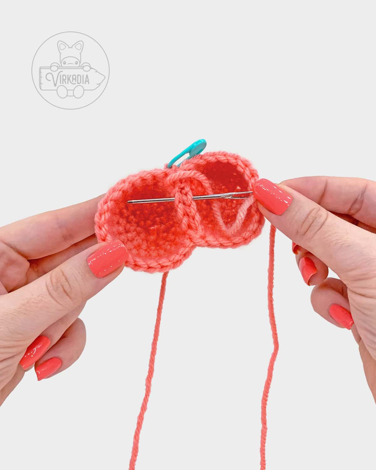 free crochet heart amigurumi pattern tutorial of how to sew the top pieces together