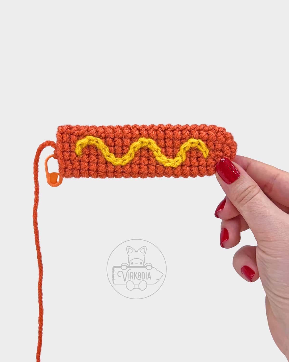 free crochet hot dog amigurumi pattern tutorial of how the finished mustard should look on the meat