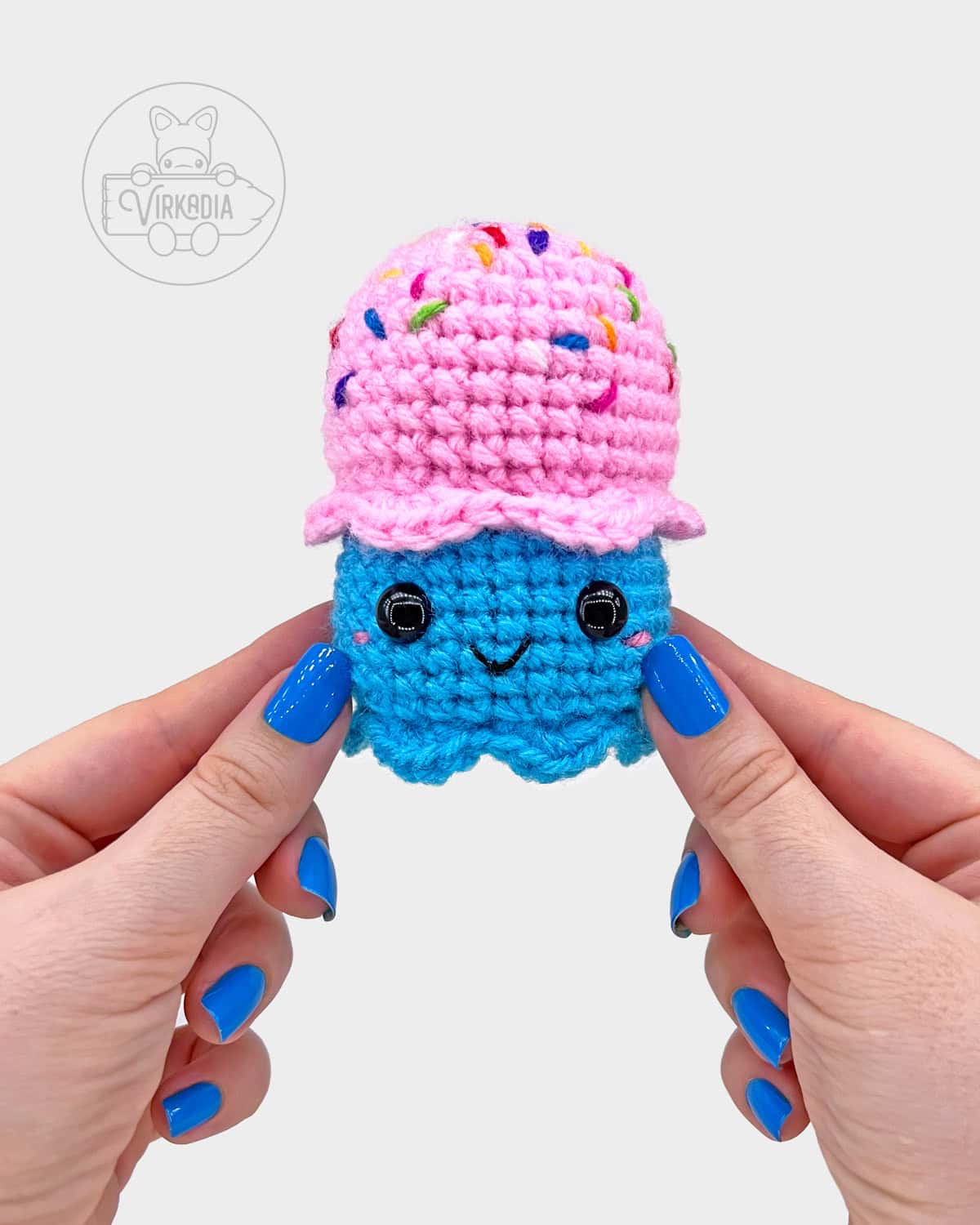 free crochet ice cream cone amigurumi pattern tutorial of how the face should look on the scoop