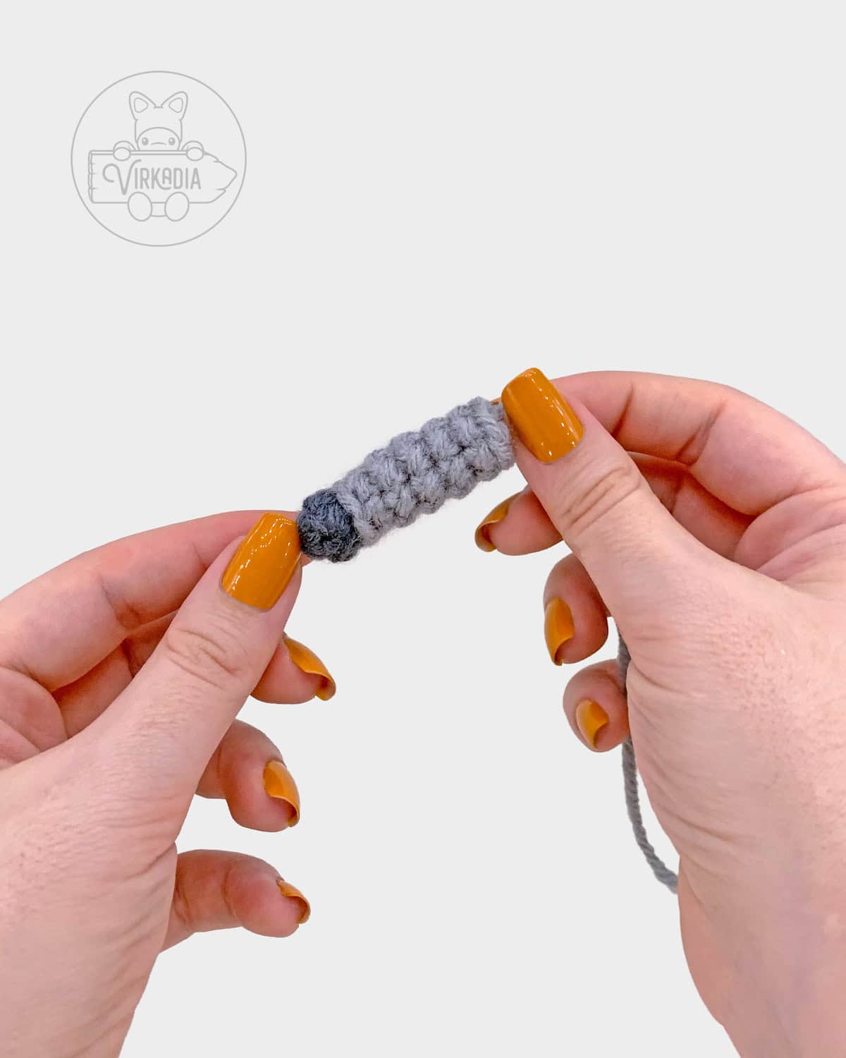 free amigurumi pattern tutorial of how the arm should look before attaching it to the body