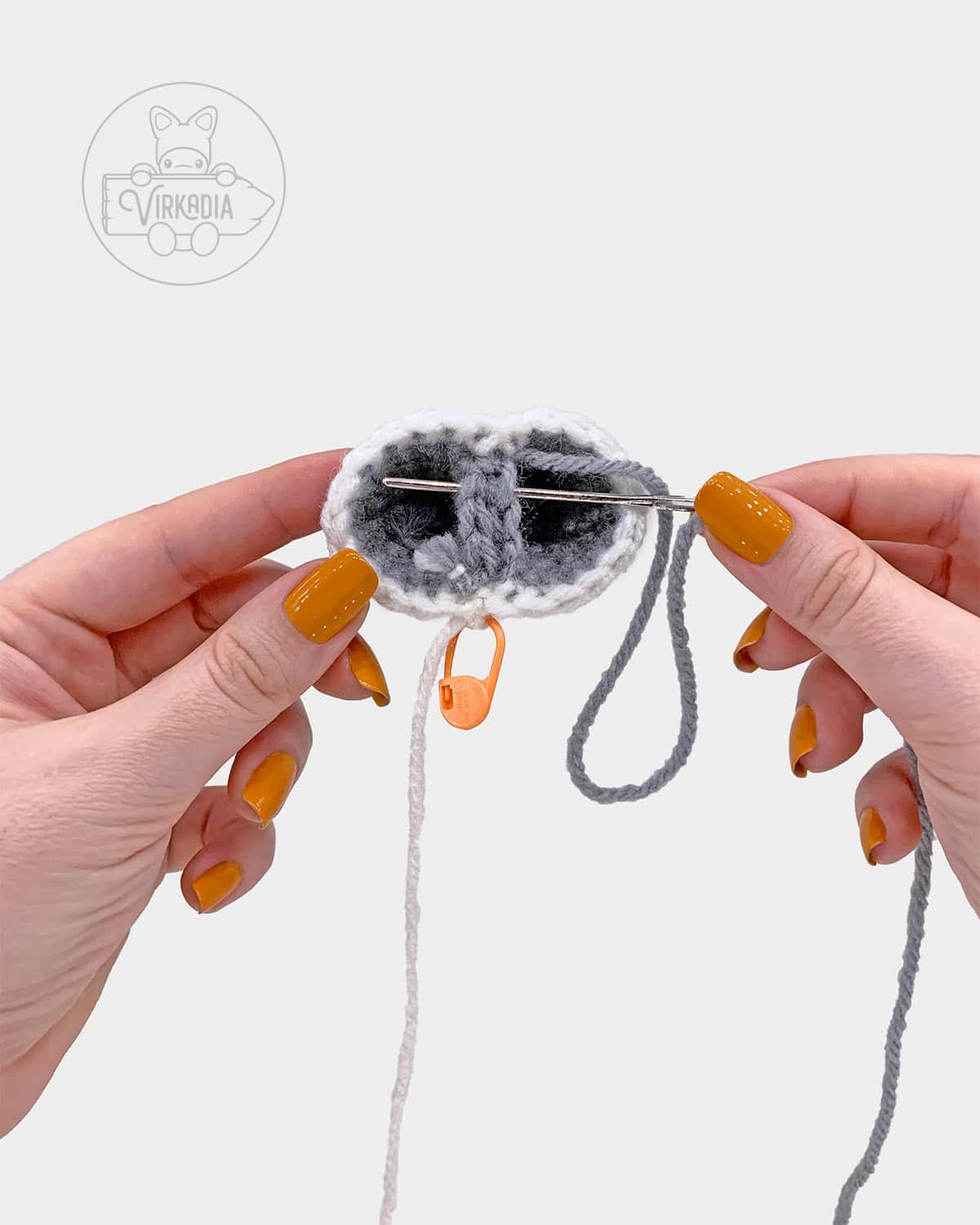 free amigurumi pattern tutorial of how to sew the legs together