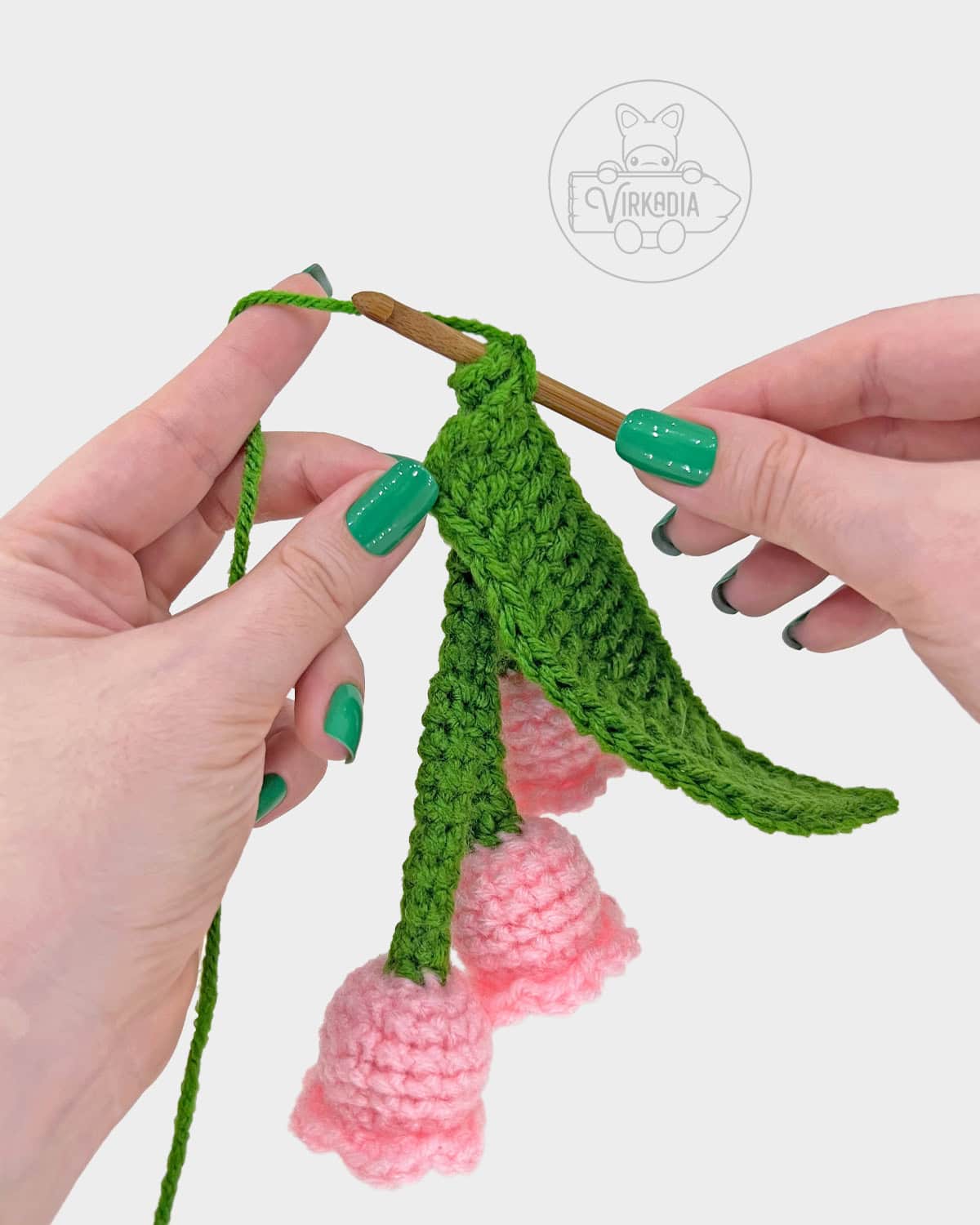 free crochet lily of the valley amigurumi pattern tutorial of how to attach the leaf to the stem