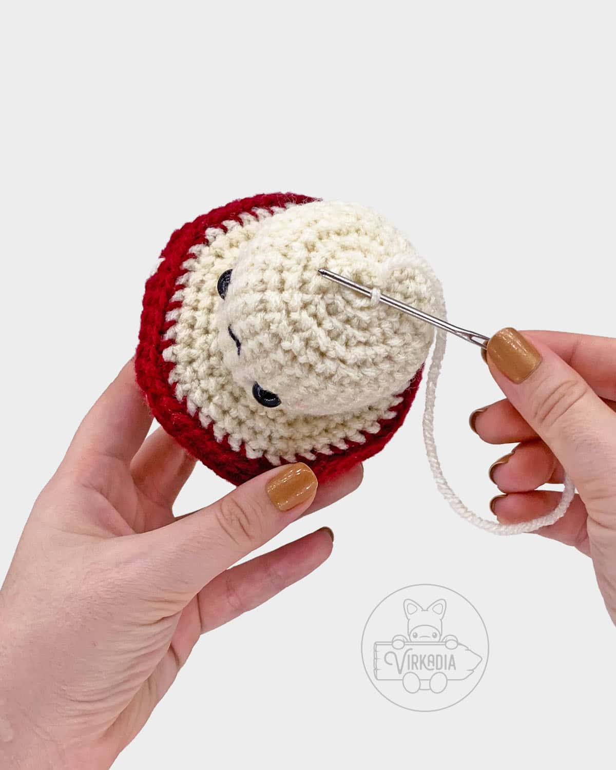 free amigurumi pattern tutorial of how to sew the bottom of the stalk closed