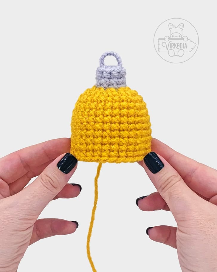 free crochet ornament amigurumi pattern tutorial of how the bauble should look before adding the face