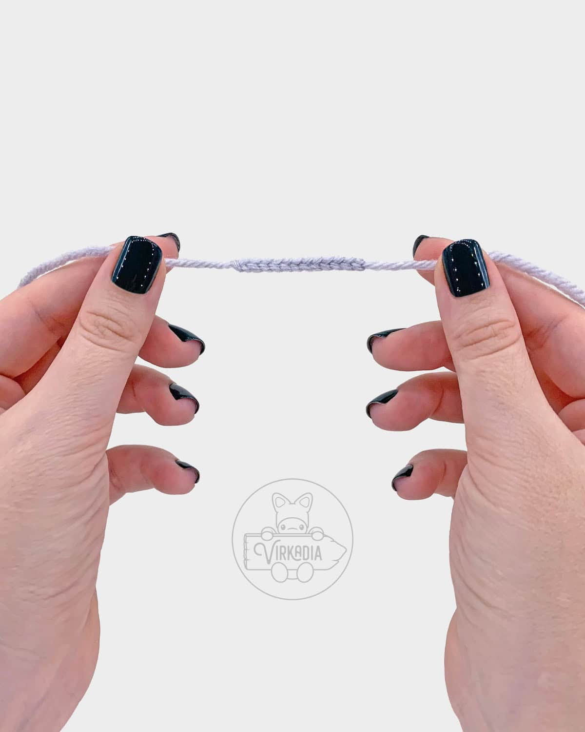 free amigurumi pattern tutorial of how the loop should look before sewing it onto the cap