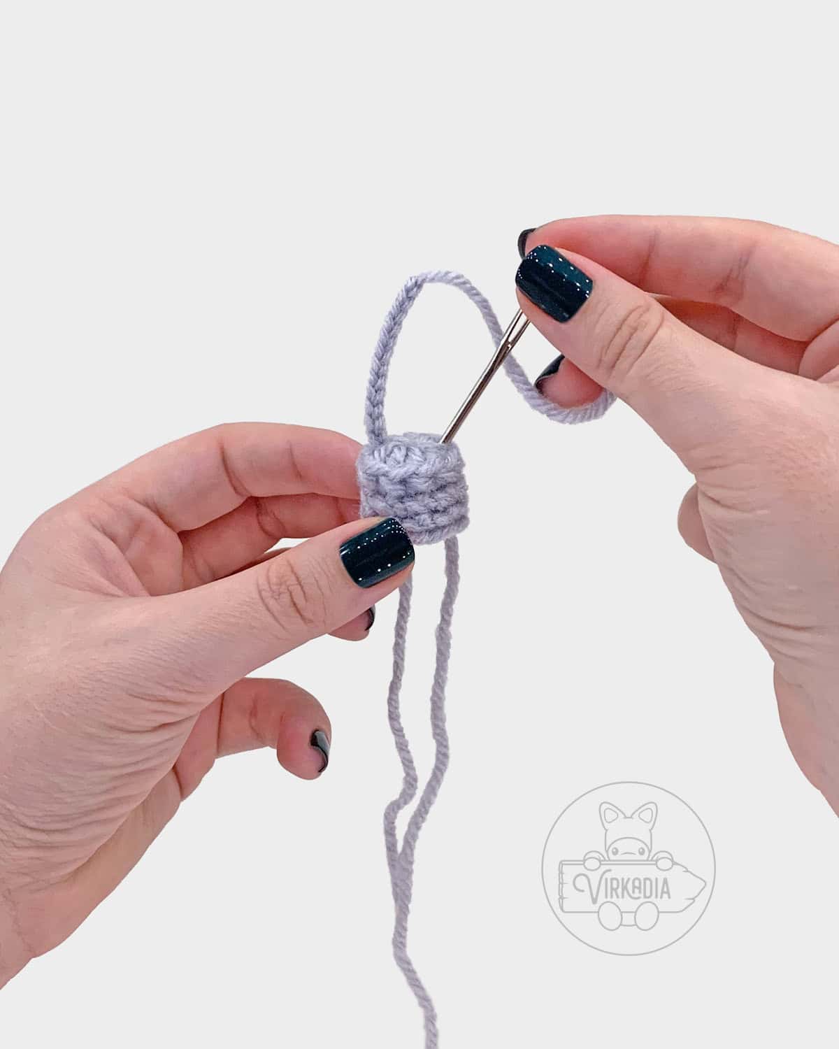 free amigurumi pattern tutorial of how to add the loop onto the cap part one
