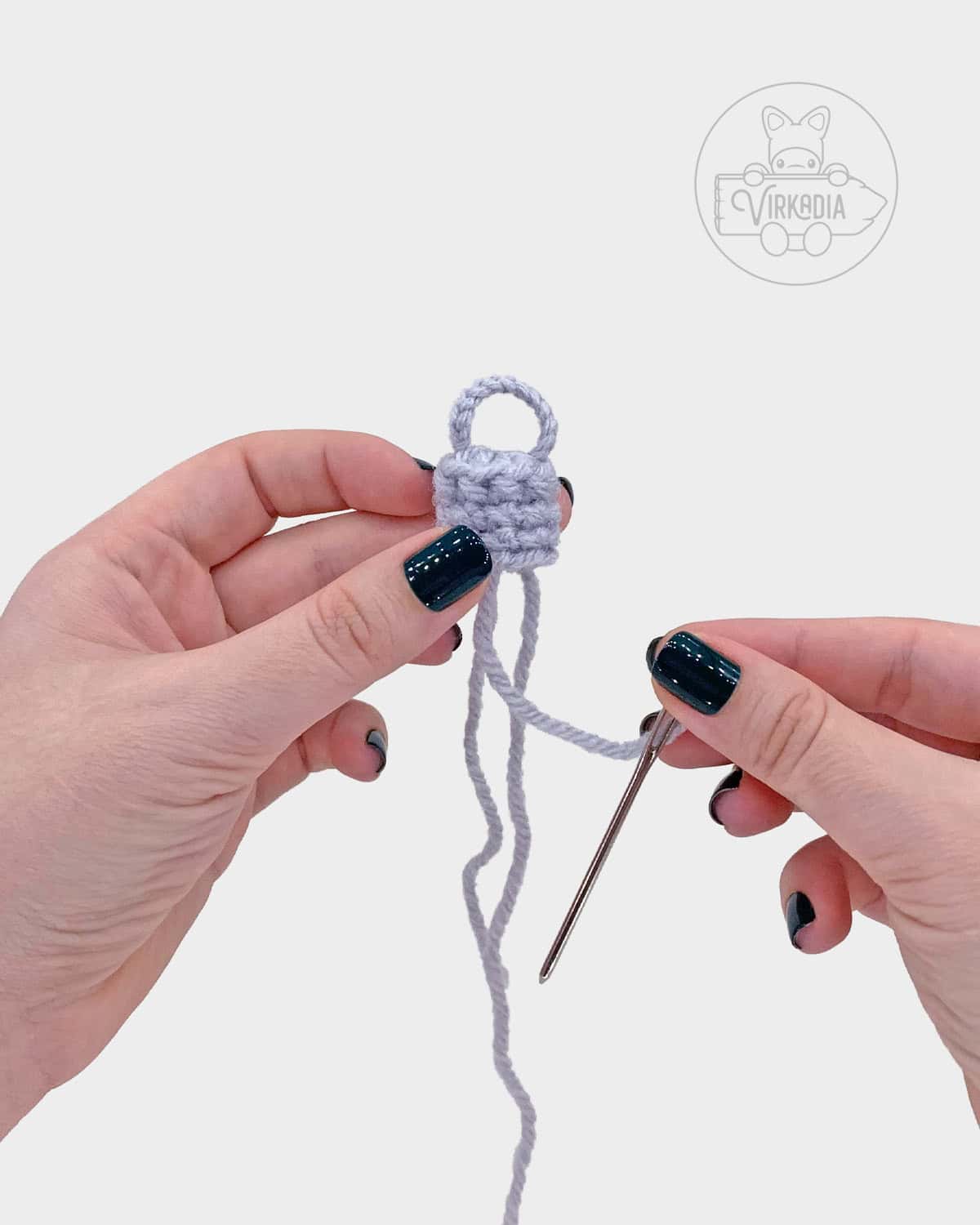 free crochet ornament amigurumi pattern tutorial of how to add the loop onto the cap part two