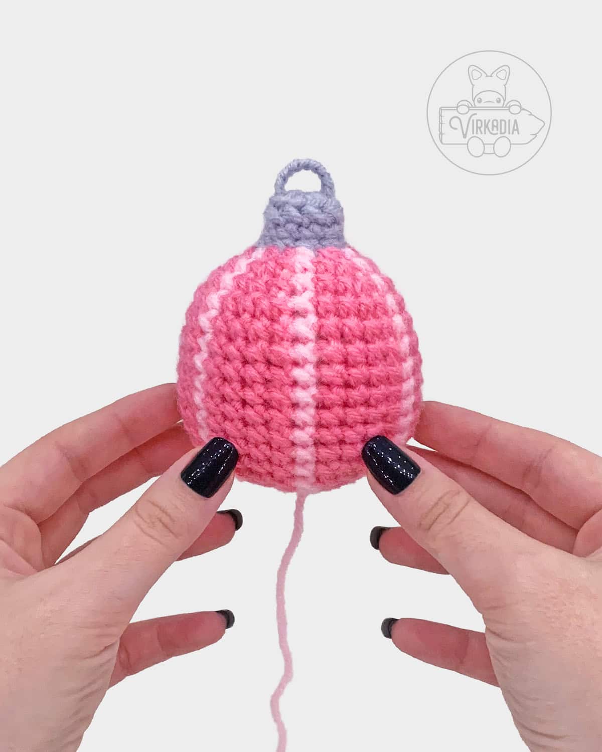free crochet bauble ornament amigurumi pattern tutorial of what the vertically striped ornament looks like