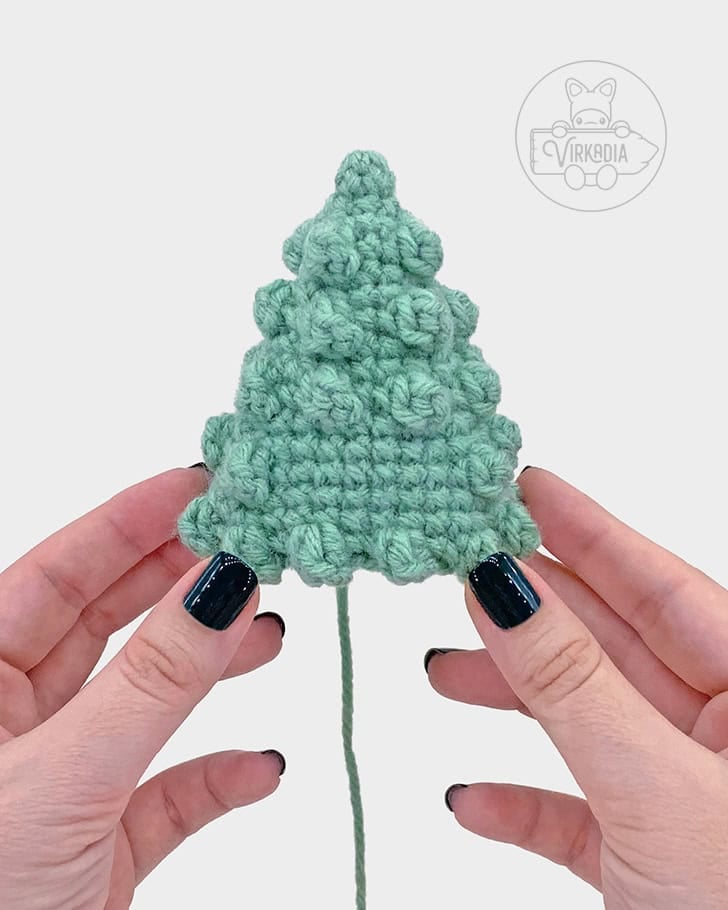free crochet pine tree amigurumi pattern tutorial of how it should look before adding the face