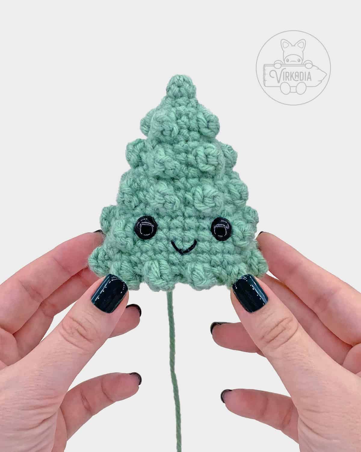 free crochet pine tree amigurumi pattern tutorial of where to embroider the face