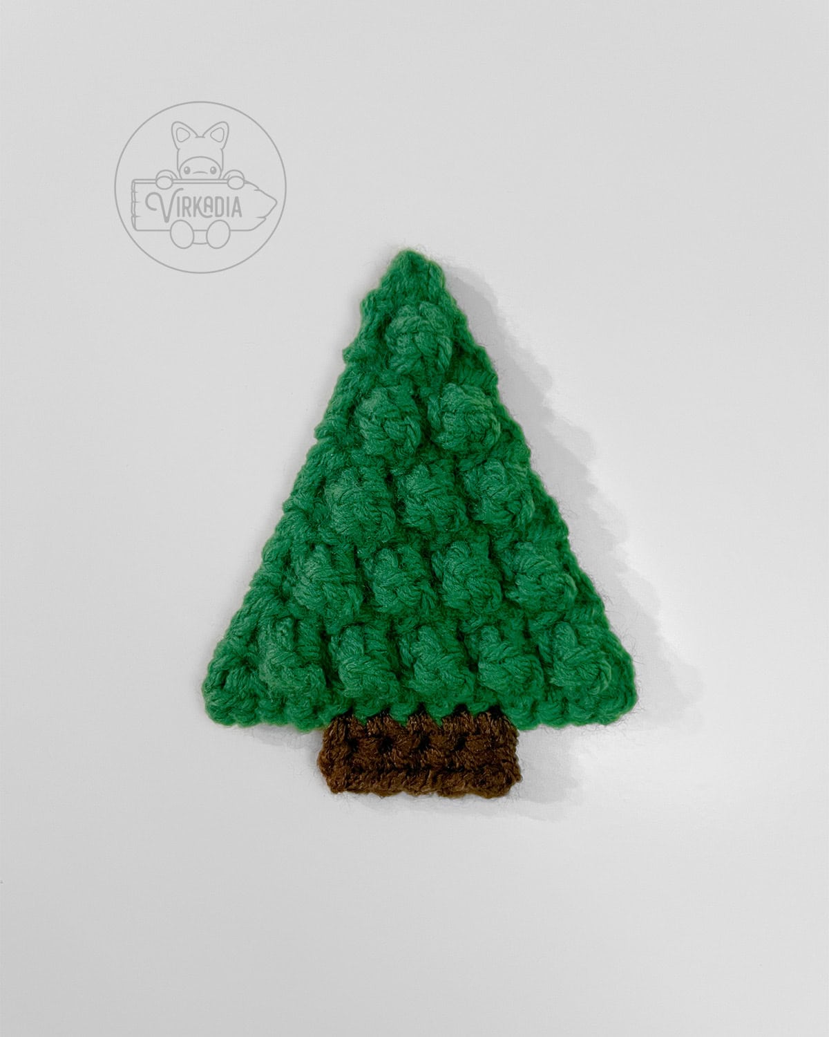 finished motif for the crochet pine tree garland for Christmas decorations, DIY holiday decor, and handmade gifts