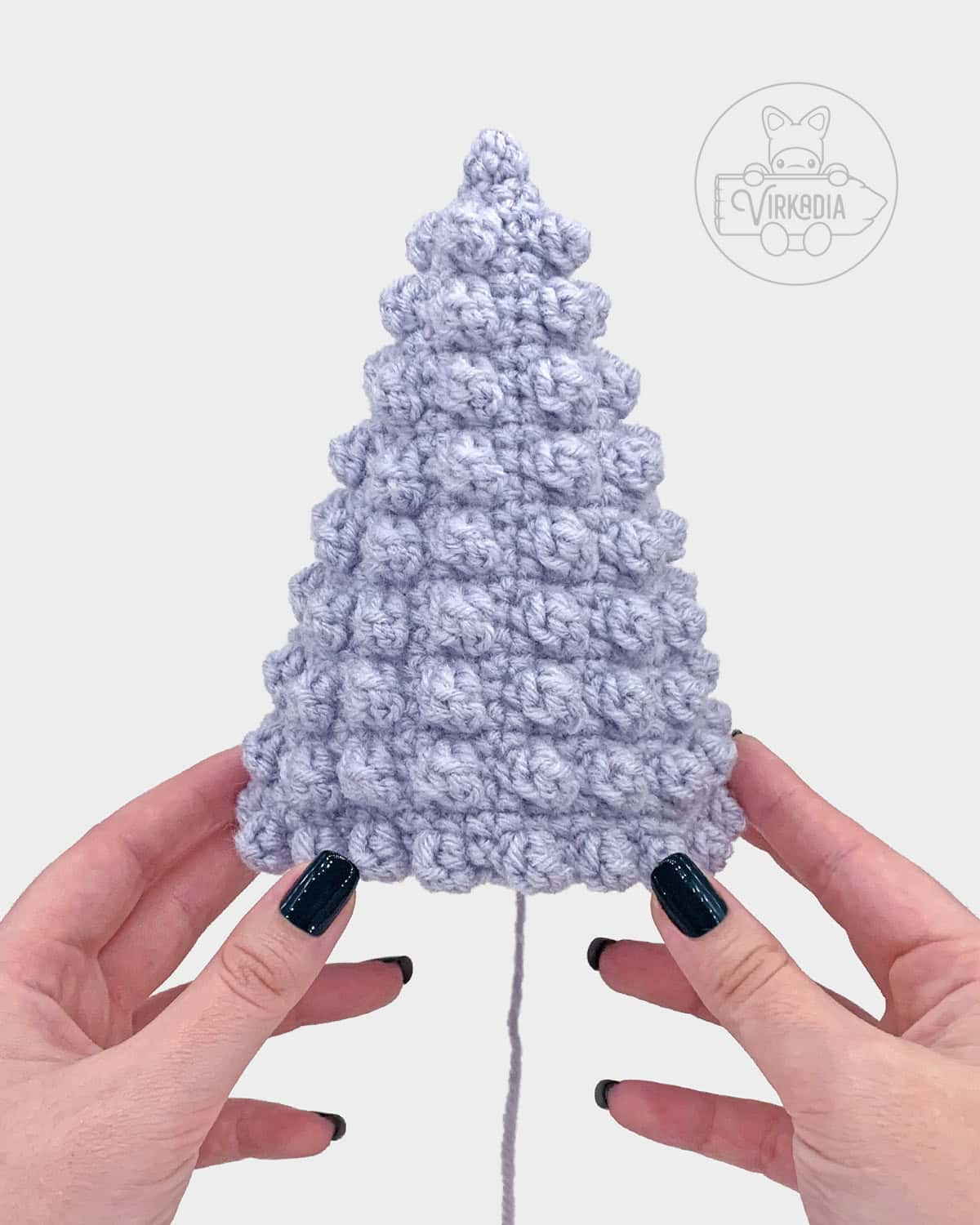 free minimalist crochet Christmas tree amigurumi pattern tutorial of what the medium tree looks like
