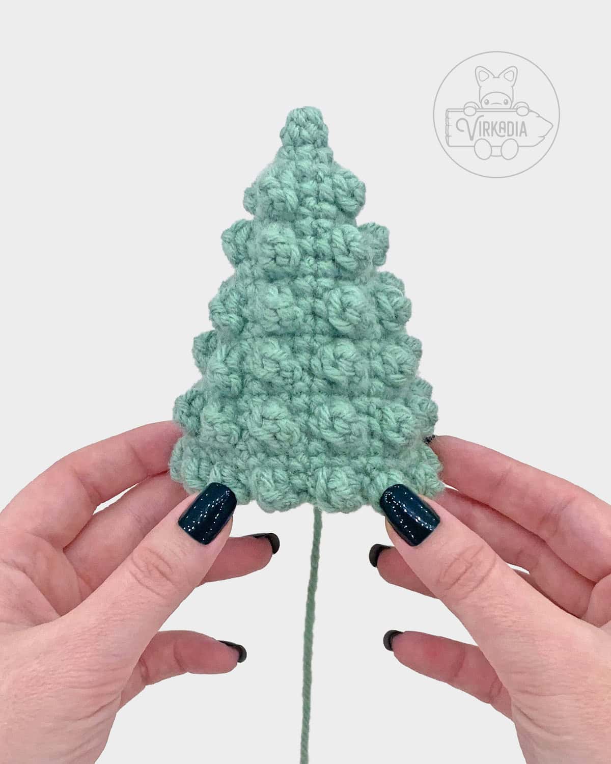 free minimalist crochet Christmas tree amigurumi pattern tutorial of what the small tree looks like
