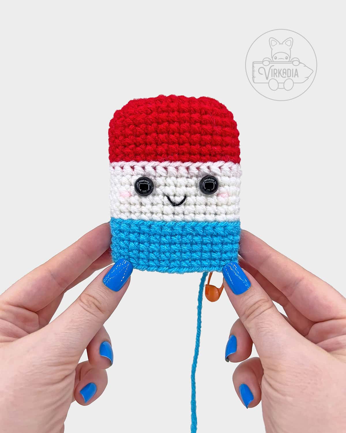 free crochet ice pop popsicle amigurumi pattern tutorial of where the face should be embroidered