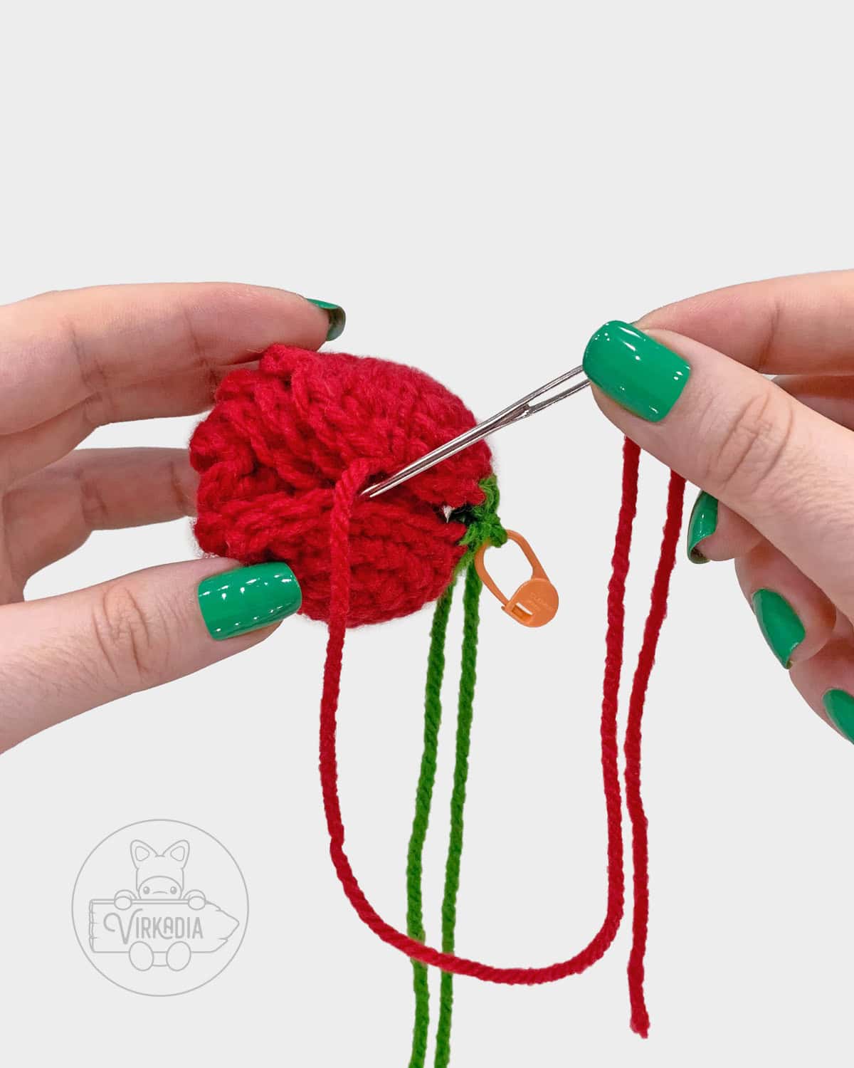 free crochet rose amigurumi pattern tutorial demonstration of how to sew the petals into a bud