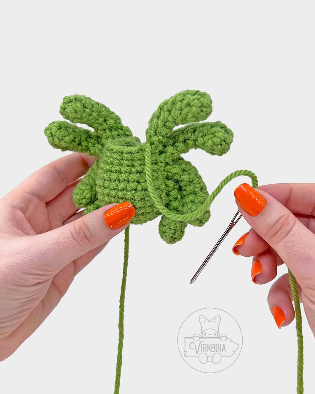 free crochet spider amigurumi pattern tutorial of how to attach the legs