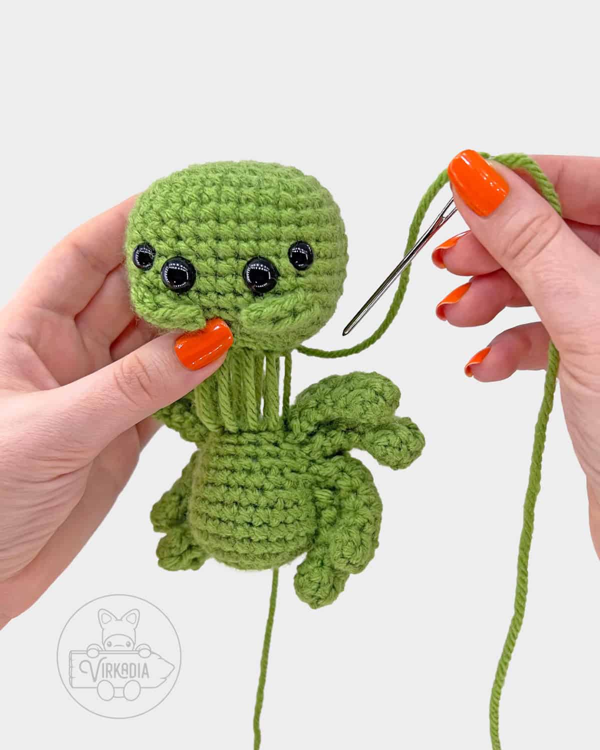 free crochet spider amigurumi pattern tutorial of how to attach the head