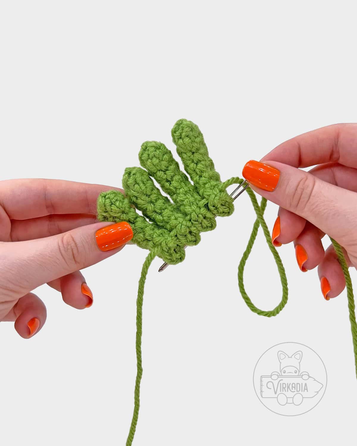 free amigurumi pattern tutorial of how to sew the legs together