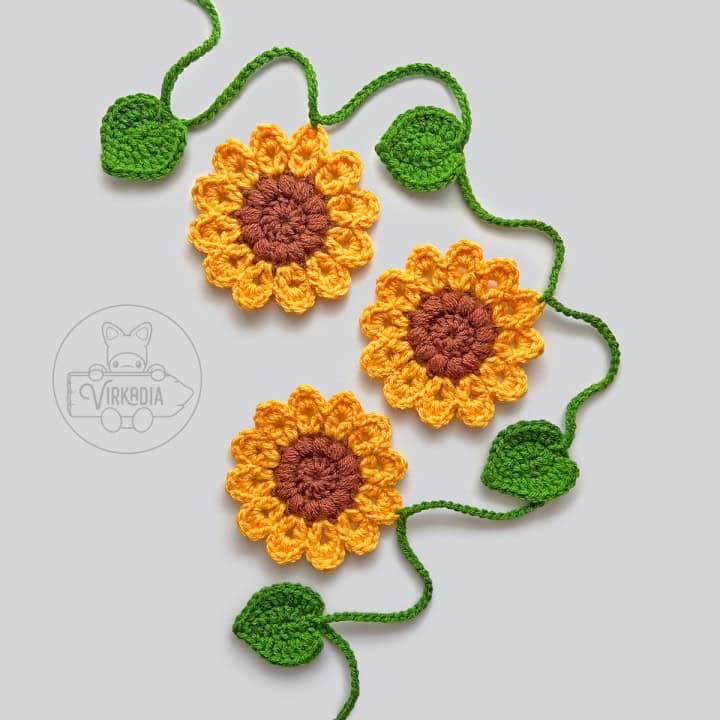 free crochet sunflower garland pattern for DIY fall decor, summer crafts, wedding decorations, and handmade holiday gifts
